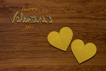 Love hearts on wooden background. Valentine's day card concept. Gold hearts on wooden background Valentines Day