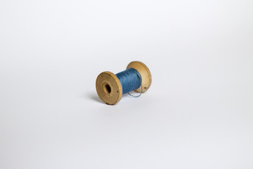 blue vintage thread on white background