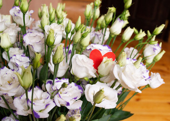 Lisianthus flowers bouquet with red heart