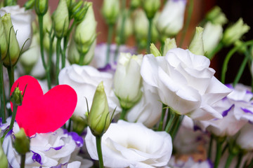 Lisianthus flowers bouquet with red heart