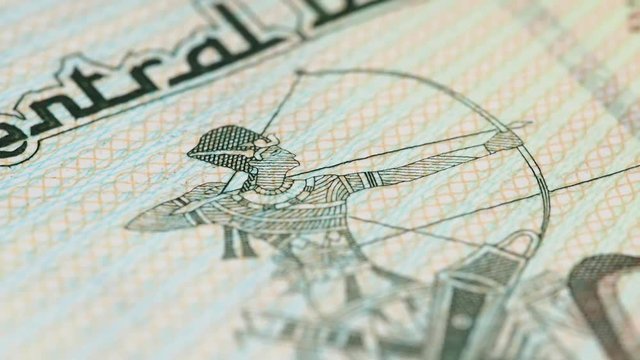 Pharaoh on war chariot on Egyptian 20 pound macro slow rotating. Low angle. Stock video footage.