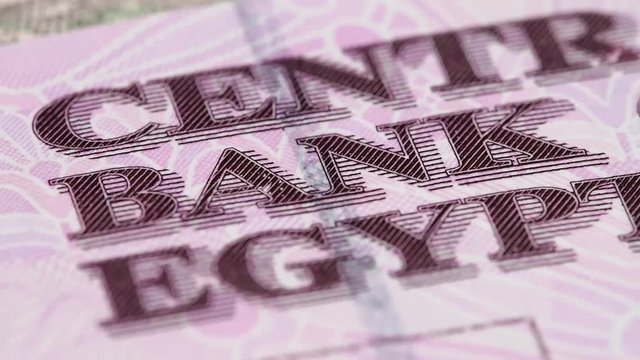 Egyptian 10 pound macro slow rotating, Central Bank of Egypt. Low angle. Stock video footage