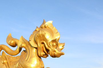 Golden Thai lion statue in Singha Park, Chiang Rai, Thailand - 247025169