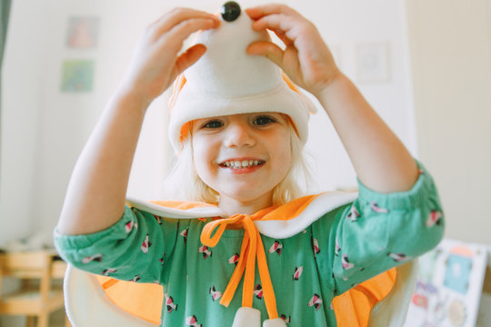 Little Baby Girl Dressed In A Fox Suit .