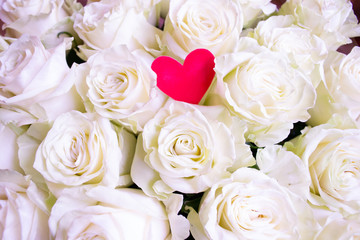 Roses flower bouquet with red heart