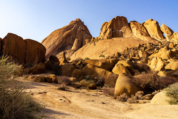 Spitzkoppe, Namibia - 24 MAY 2017: Camping with a 4x4 car (Toyota Hilux) and roof top tent. © Christopher