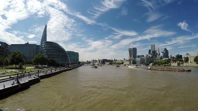 Beautiful panoramic view of boats on Thames and The Shard, City Hall and Financial District in London, UK