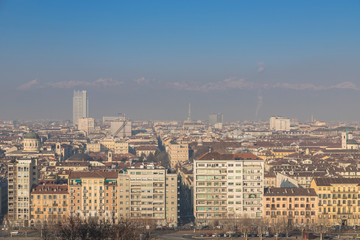 Overview of the city of Turin, seen from the "Monte dei Cappuccini". Sunny day in winter with light atmospheric pollution.