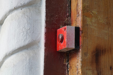 old red padlock on the door