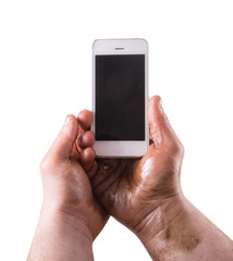  white phone in dirty hands