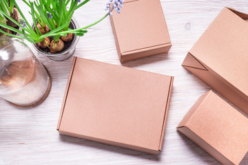 Fototapeta premium Cardboard boxes on wooden table