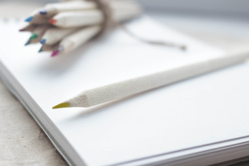 Color pencils and notebook