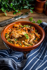 Fried chicken fillet with vegetables.