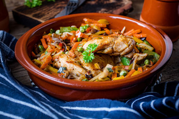 Fried chicken fillet with vegetables.