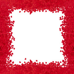 Love frame made of red confetti hearts, isolated on white.