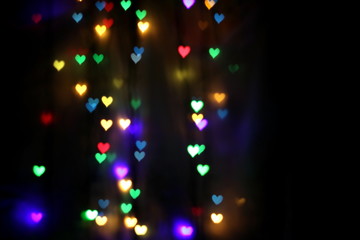 colorful bokeh in the shape of hearts