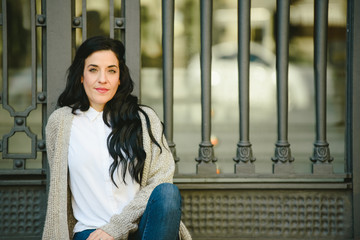 Friendly housewife looking at camera