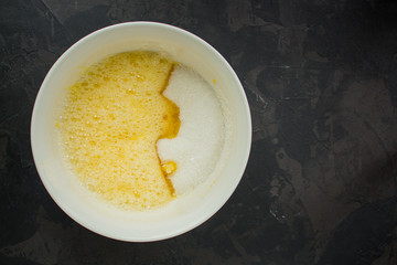 raw dough and apples (eggs, flour and other ingredients apples - Charlotte). food background. copy space