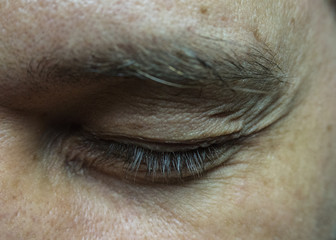 Closed male eye