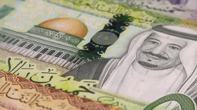 Saudi Arabia riyal notes rotating. Saudi Arabian money. Saudi Arabia economy. Low angle. Stock video footage