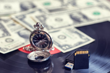 Concept: changing media over time from records to flash memory