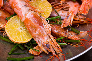 set langoustine shell with a crest sharp on his head with a lemon delicious delicacy a delicious appetizer for beer