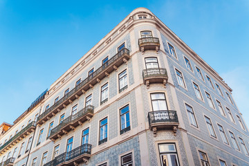 Blue and white traditional tiled building in Lisbon, Portugal