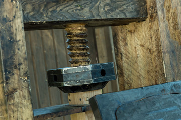 abstract background vertical wooden screw clamp natural weather-beaten old with metal clamp texture grunge