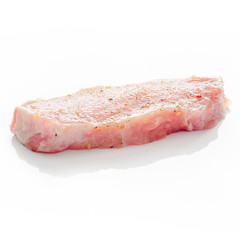 Raw pork meat on a white background
