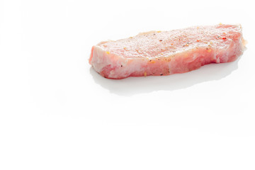 Raw pork meat on a white background