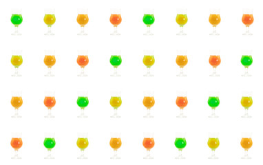 pattern background glass of bright refreshing cocktail drink tequila with lemon juice cosmopolitan lemonade design colorful green red mix