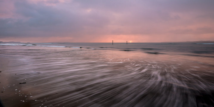 Orewa beach at sunset