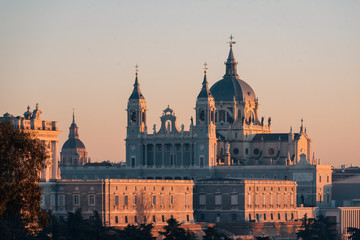 Fototapeta na wymiar View of the Almudena Cathedral at sunset, from the Templo de Debod, in Madrid, Spain
