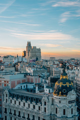 Fototapeta premium View of Gran Via from the Circulo de Bellas Artes rooftop at sunset, in Madrid, Spain