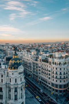 View of Gran Via from the Circulo de Bellas Artes rooftop at sunset, in Madrid, Spain