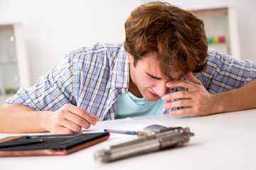 Young man in depression committing suicide