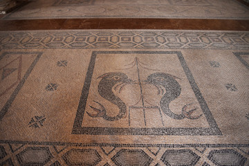 Rhodes town is a walled city It is a maze of narrow streets and alleyways full of ancient historical buildings andd details