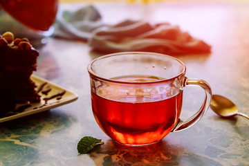 Traditional English afternoon tea and cake with chocolate
