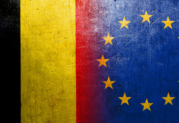 European Union and Belgium flags on the grunge metal background