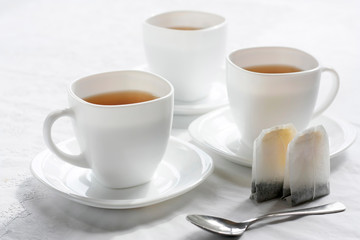 White cup with black tea. Good start to the day