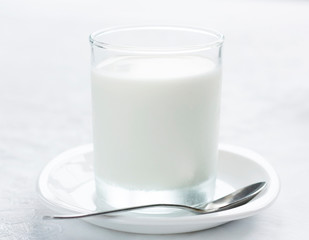 Cow's milk in a clear glass. Dietary nutritious healthy breakfast