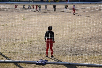 Ascene of a boys soccer match