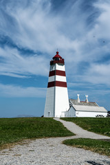 Fototapeta na wymiar Leuchtturm von Alnes auf der Insel Godøya bei Ålesund