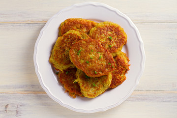 Potato Cakes. Vegetable fritters, latkes, draniki. Vegetable pancakes. horizontal, overhead