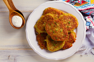 Potato Cakes. Vegetable fritters, latkes, draniki. Vegetable pancakes. horizontal, overhead