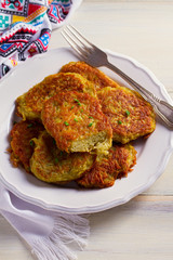 Potato Cakes. Vegetable fritters, latkes, draniki. Vegetable pancakes. vertical