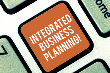 Conceptual hand writing showing Integrated Business Planning. Business photo text minimizing risk and maximizing profit Keyboard key Intention to create computer message idea