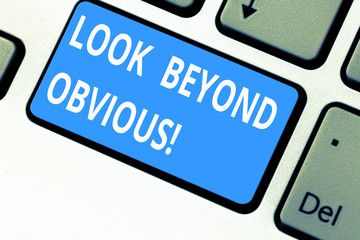Text sign showing Look Beyond Obvious. Conceptual photo asking to see more deeply into subject or matter Keyboard key Intention to create computer message pressing keypad idea