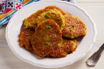 Potato Cakes. Vegetable fritters, latkes, draniki. Vegetable pancakes. horizontal