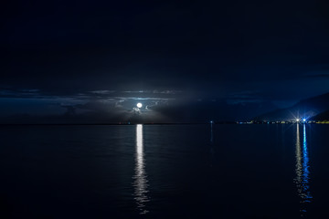 Fototapeta premium Breathtaking moonlight over the ocean